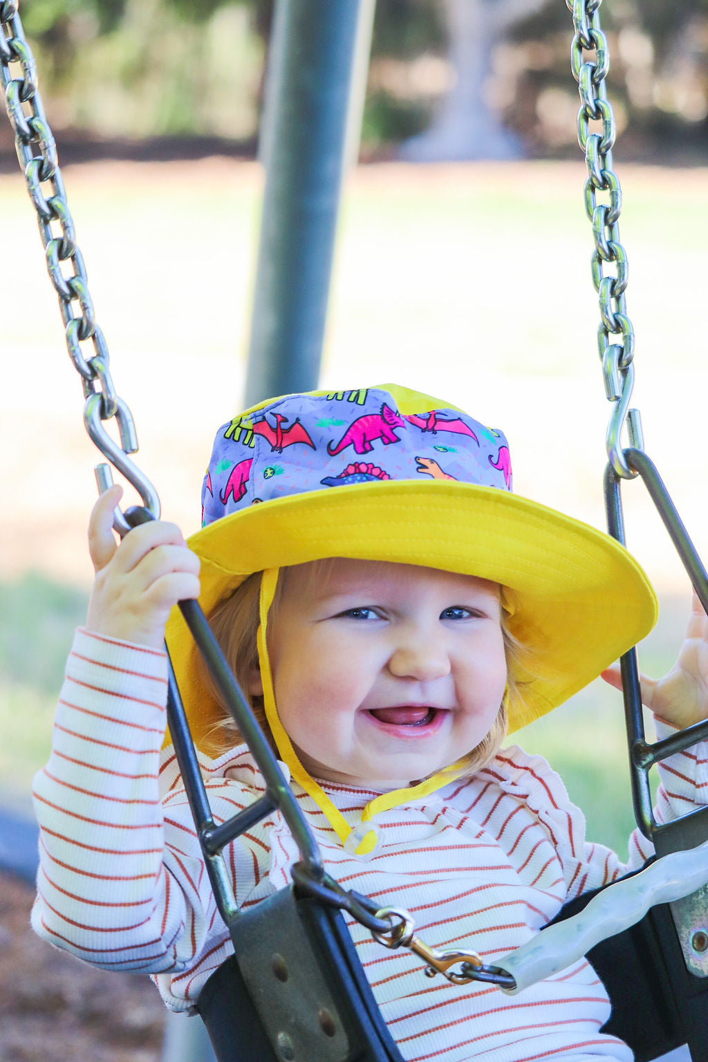 Sunsafe hat (yellow and purple) - Daring Dinosaurs